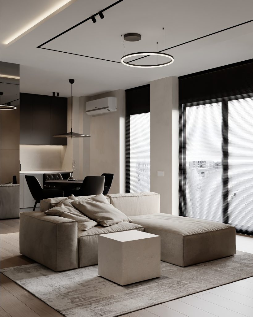 Living cu canapea bej de colț și lustră inelară, lângă ușile spre balcon, apartament în Cluj-Napoca